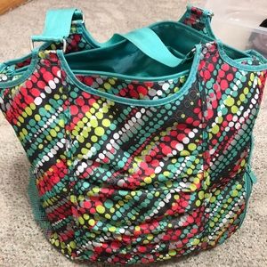 Multiple thirty one bags and Vera Bradley wallet.